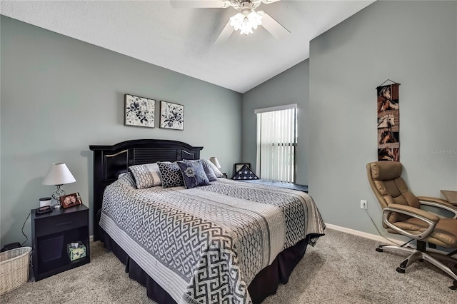 carpeted bedroom featuring lofted ceiling, a ceiling fan, and baseboards