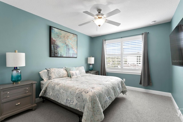 bedroom featuring carpet floors, ceiling fan, and baseboards