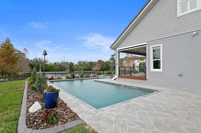 view of swimming pool featuring a fenced in pool, a patio area, and a fenced backyard