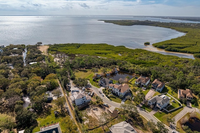 bird's eye view featuring a residential view and a water view