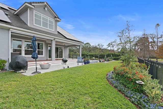 view of yard featuring a patio area and a fenced backyard