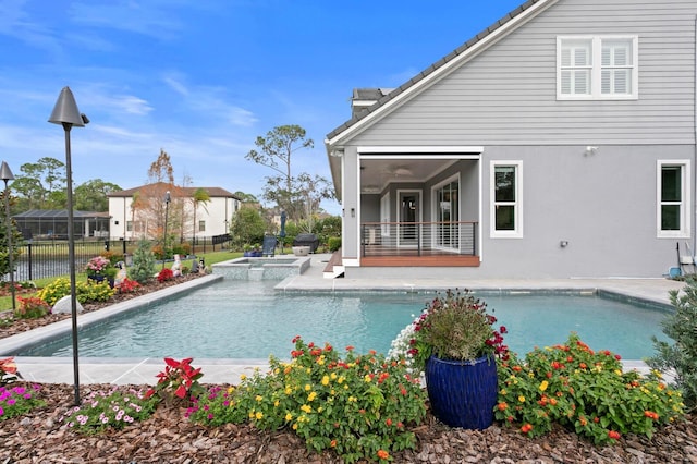 view of swimming pool featuring fence, a fenced in pool, and a patio