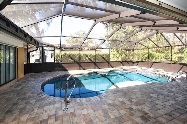 pool featuring a patio area and a lanai