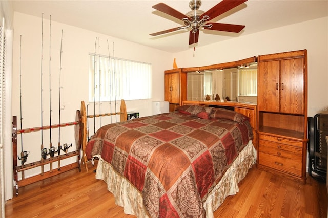 bedroom featuring light wood-style flooring