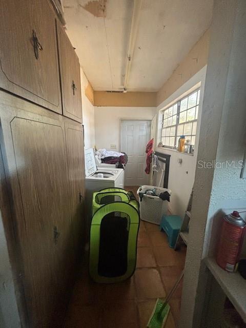 kitchen featuring washing machine and dryer