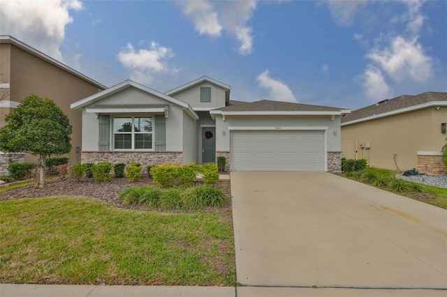 view of front of property featuring a garage, concrete driveway, stone siding, stucco siding, and a front yard