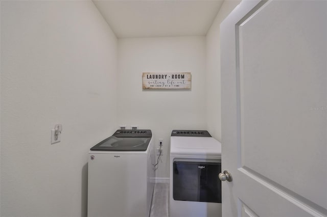 laundry area with laundry area and separate washer and dryer