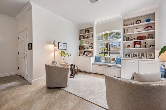 living area with built in features, visible vents, crown molding, and baseboards