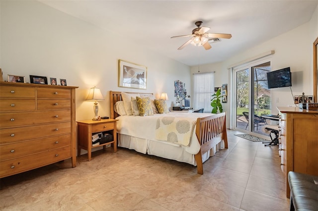 bedroom featuring access to exterior and a ceiling fan