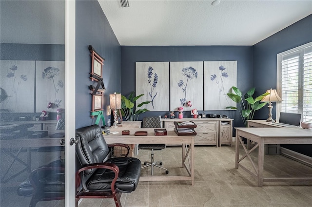 office area featuring visible vents