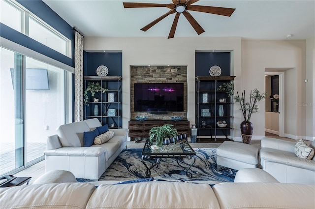living room with a ceiling fan