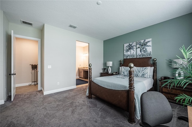 bedroom with visible vents, carpet flooring, and baseboards