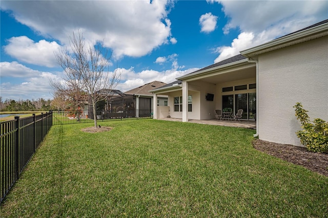 view of yard featuring a patio and a fenced backyard