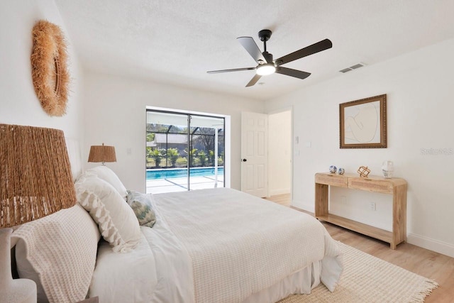 bedroom with light wood finished floors, visible vents, a ceiling fan, access to outside, and baseboards