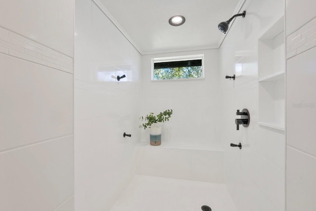 bathroom featuring a tile shower