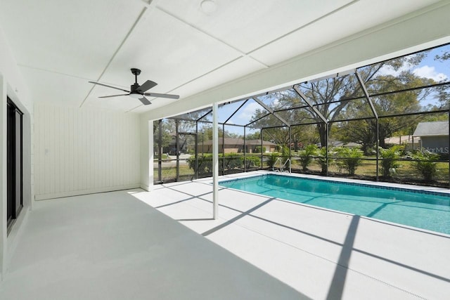 pool featuring a lanai, a patio area, and ceiling fan