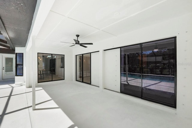 view of patio / terrace featuring ceiling fan