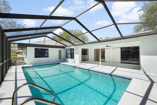 pool featuring a lanai and a patio