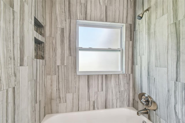 bathroom featuring shower / bath combination