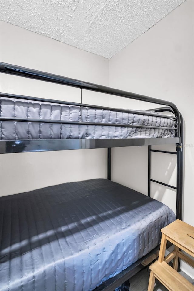 unfurnished bedroom featuring a textured ceiling