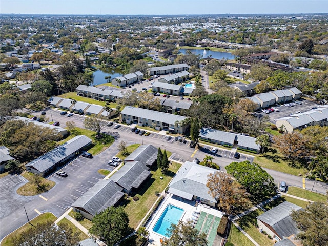 birds eye view of property with a residential view and a water view