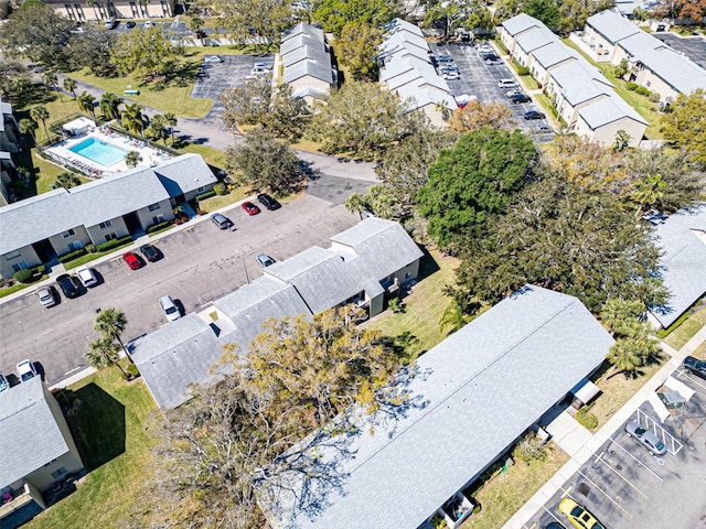 birds eye view of property with a residential view