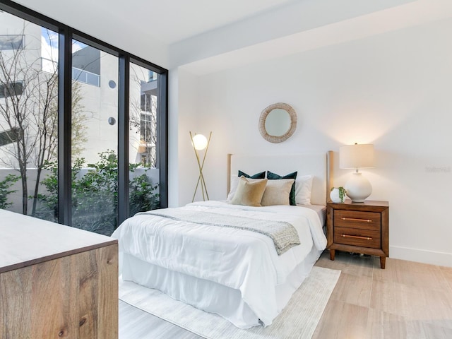 bedroom featuring baseboards