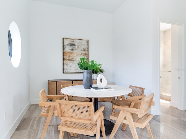 dining room with baseboards