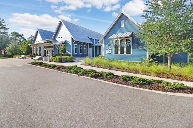 view of home's exterior featuring driveway