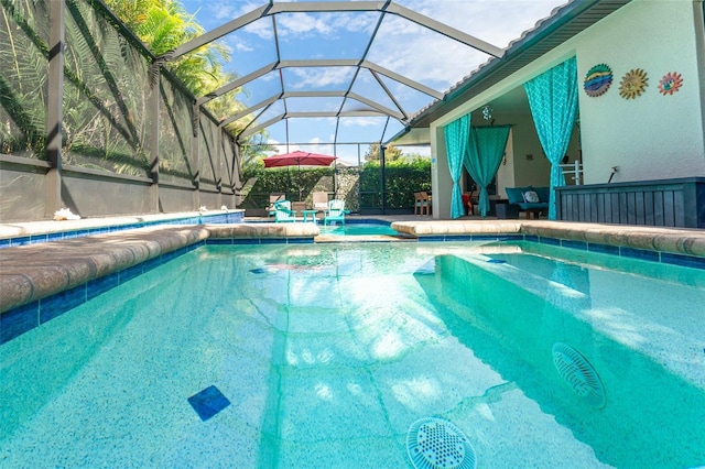 view of swimming pool with a patio and a fenced in pool