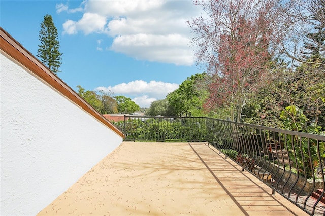 view of patio / terrace with a balcony