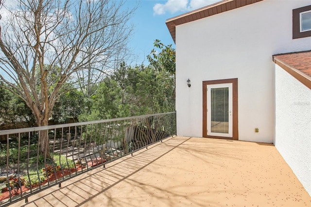 view of patio / terrace with a balcony