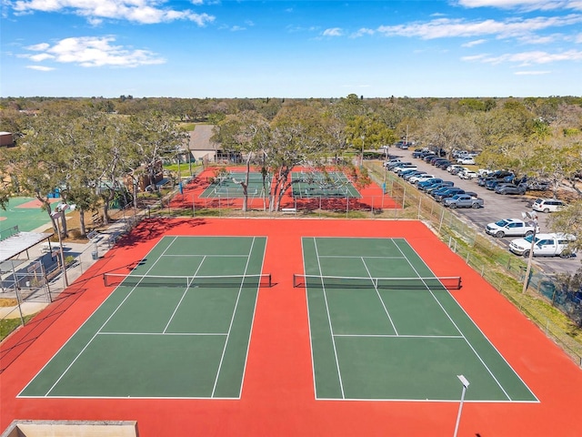 view of sport court with fence