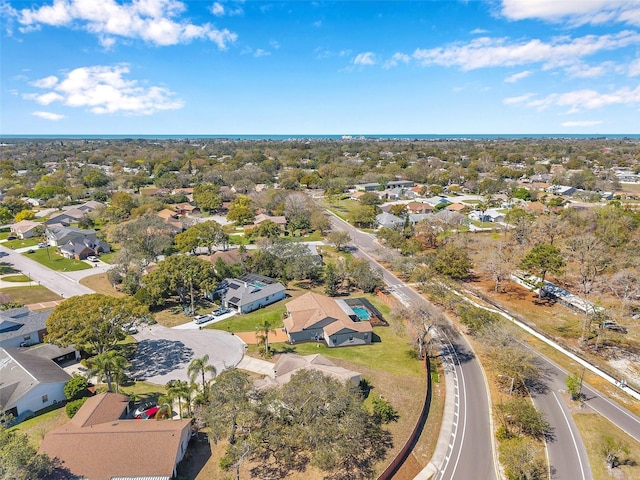 birds eye view of property with a residential view