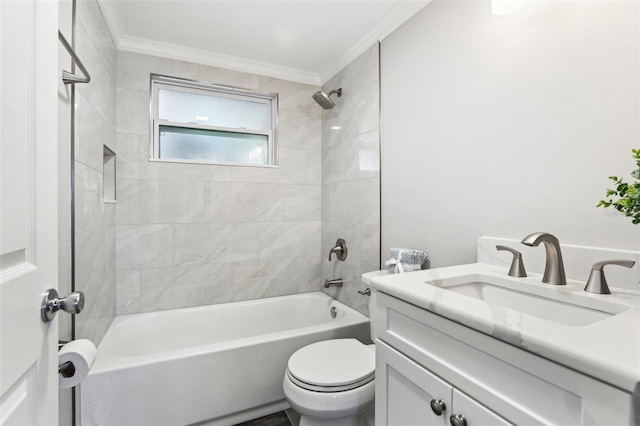 bathroom featuring tub / shower combination, toilet, ornamental molding, and vanity