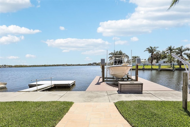 view of dock with boat lift and a water view