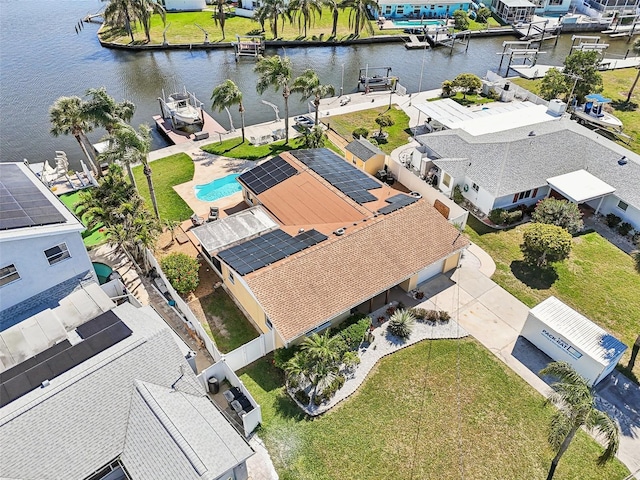 bird's eye view with a residential view and a water view