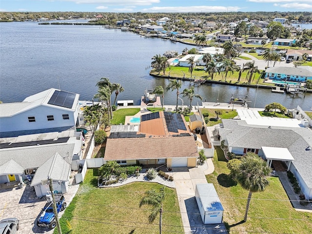 birds eye view of property featuring a residential view and a water view