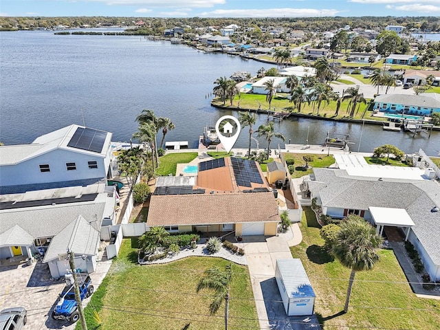 bird's eye view with a residential view and a water view