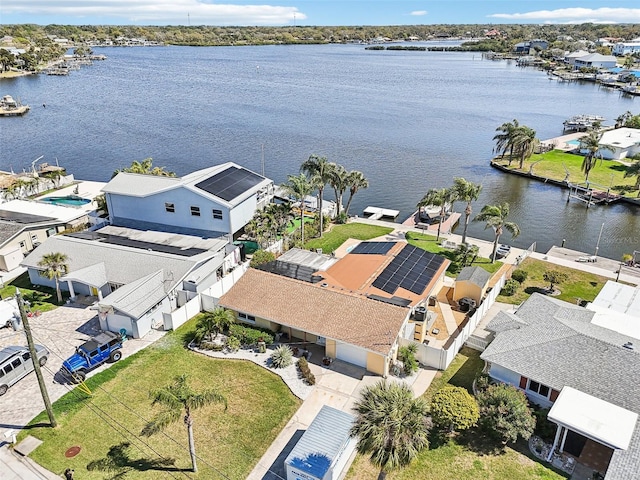 aerial view with a residential view and a water view