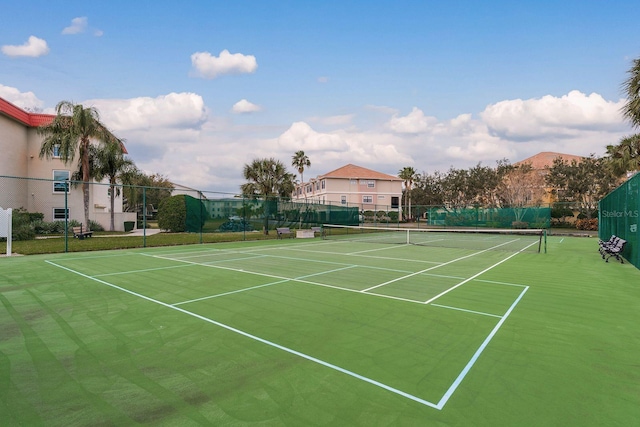 view of sport court with community basketball court and fence