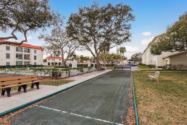 view of home's community featuring a lawn