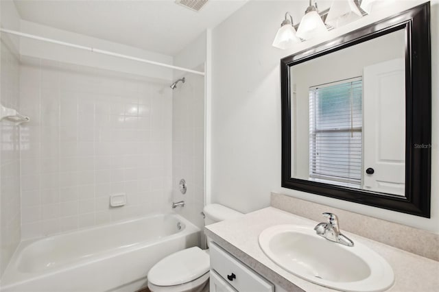 bathroom featuring toilet, shower / tub combination, visible vents, and vanity