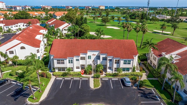 birds eye view of property featuring a residential view and view of golf course