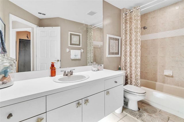 bathroom with visible vents, shower / tub combo, toilet, and tile patterned floors