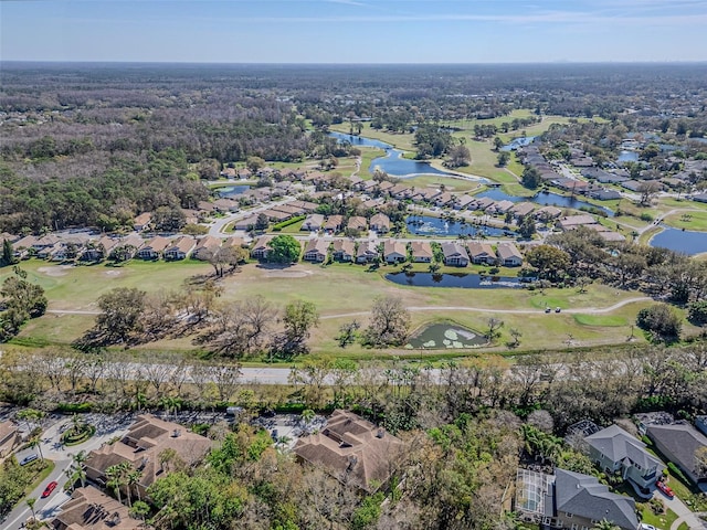 bird's eye view with a water view, a residential view, and golf course view