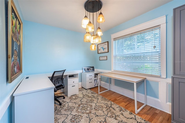 office space featuring light wood-type flooring