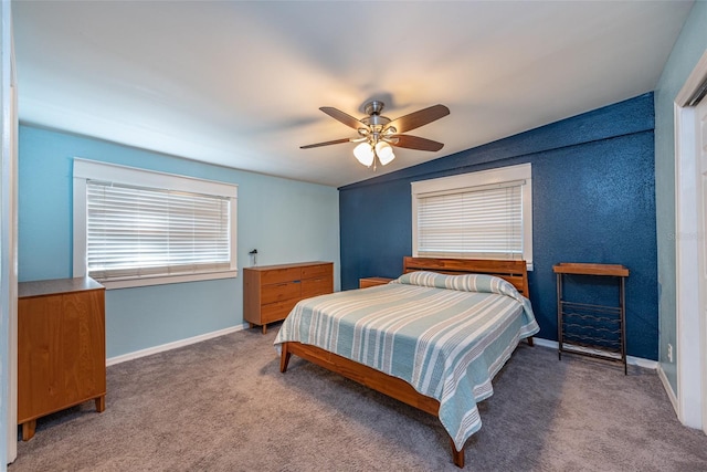 bedroom featuring carpet floors, baseboards, and a ceiling fan