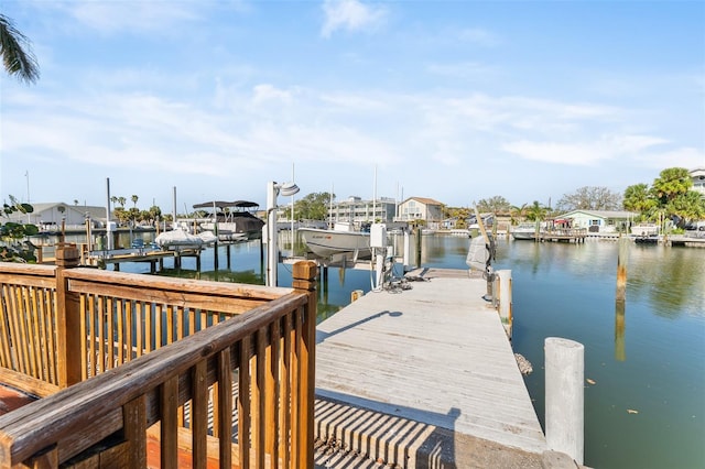 view of dock featuring a water view and boat lift