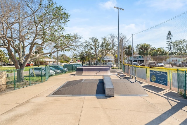 view of property's community with fence